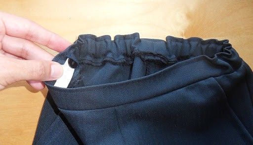 Ajustar un pantalón con goma y regulador